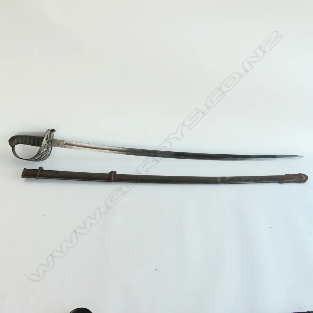 An 1827 Pattern Rifle Regiment Officer's sword, the hilt with open swept guard with cypher of bugle suspended from a crown, Image 1++