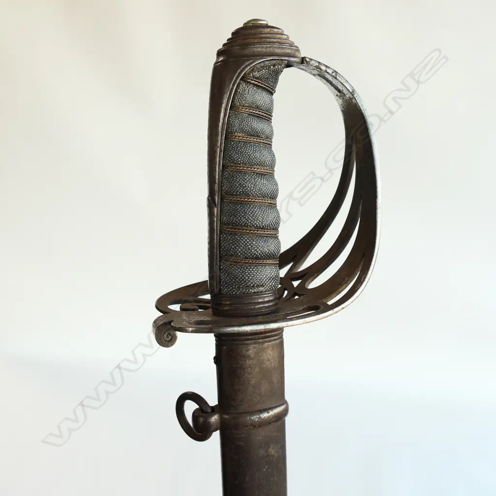 An 1827 Pattern Rifle Regiment Officer's sword, the hilt with open swept guard with cypher of bugle suspended from a crown, Image 1++
