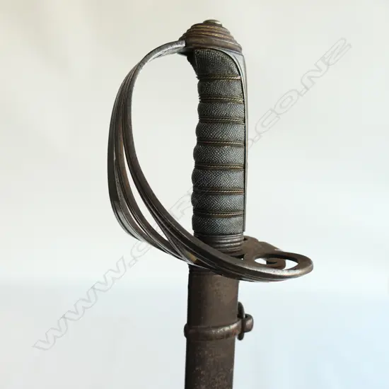 An 1827 Pattern Rifle Regiment Officer's sword, the hilt with open swept guard with cypher of bugle suspended from a crown,