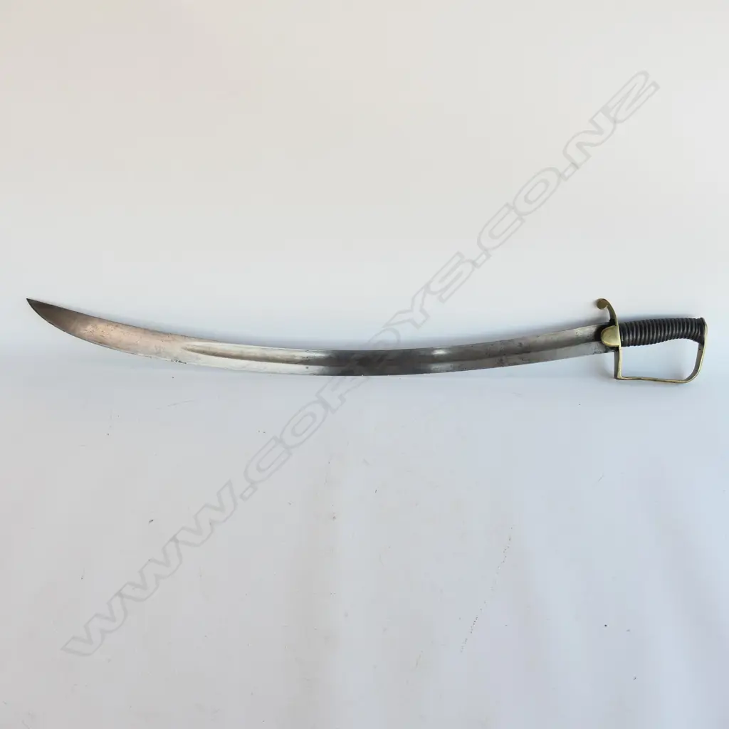 A Light Cavalry Officer’s Pattern 1796 Sabre, marked ‘Osborn’ on blade back, with brass stirrup hilt with half-round langets, iron grooved grip, single fullered 755mm blade, cleaned, edge chips. No scabbard Image 1++