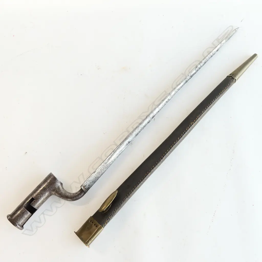 British ‘Brown Bess’ Socket Bayonet and Scabbard, good 430mm blade carries ordnance inspectors mark and minor staining.  The leather scabbard with brass fittings. Image 1++