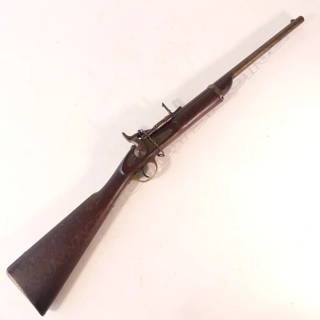 A Snider .577 calibre Mk.III Action Carbine 19" barrel, lock marked crown-over VR, 1862 over Enfield NZ over 87 marked on breech and stock. Image 1++