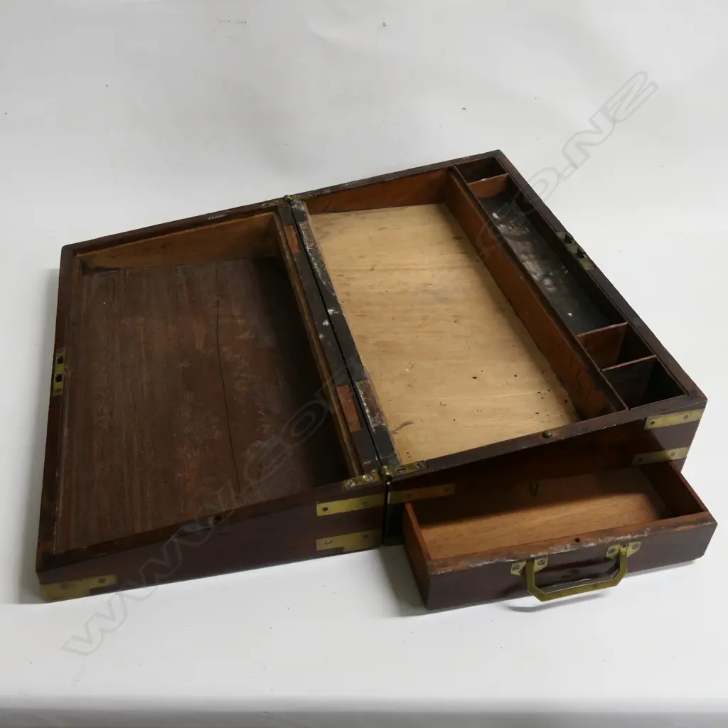 An Officer's mahogany writing box with engraved brass plaque to the lid ‘Captain Oldfield. Royal Engineers’, brass capped and bound and recessed brass handles, 455 x 250 x 145mm. Image 1++