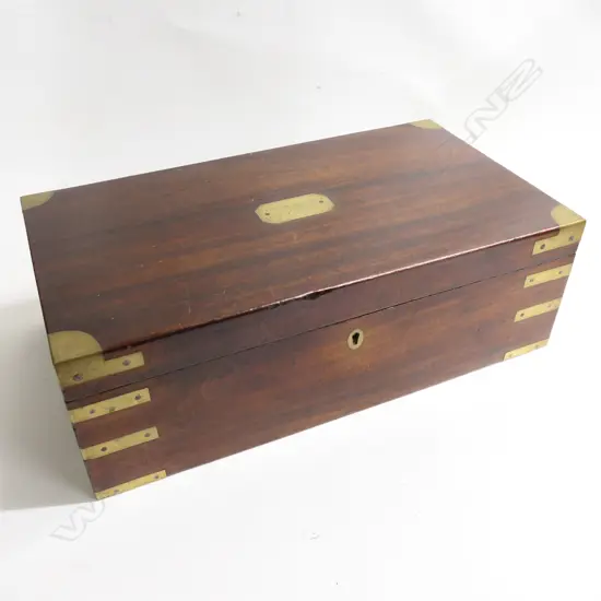 An Officer's mahogany writing box with engraved brass plaque to the lid ‘Captain Oldfield. Royal Engineers’, brass capped and bound and recessed brass handles, 455 x 250 x 145mm.