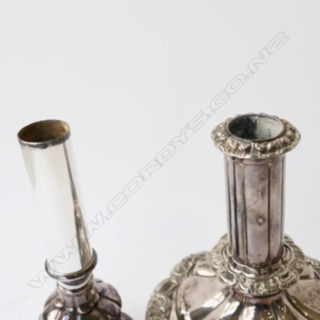 A pair of 19thC Old Sheffield Plate telescopic candlesticks. H.280mm extended. Note:  one telescopic extension faulted (does not remain extended and falls down). Dia. nozzle, 25mm and drip tray 63mm. Image 1++