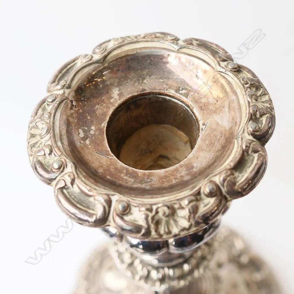 A pair of 19thC Old Sheffield Plate telescopic candlesticks. H.280mm extended. Note:  one telescopic extension faulted (does not remain extended and falls down). Dia. nozzle, 25mm and drip tray 63mm. Image 1++