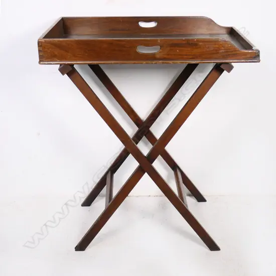 A late Victorian period mahogany butlers tray table on traditional folding X-shaped base.  760 x 530mm