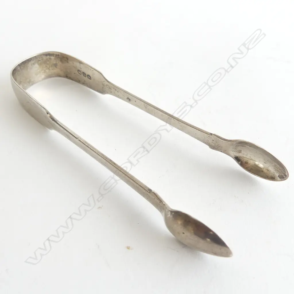 A pair of George III period fiddle pattern silver sugar tongs Image 1++