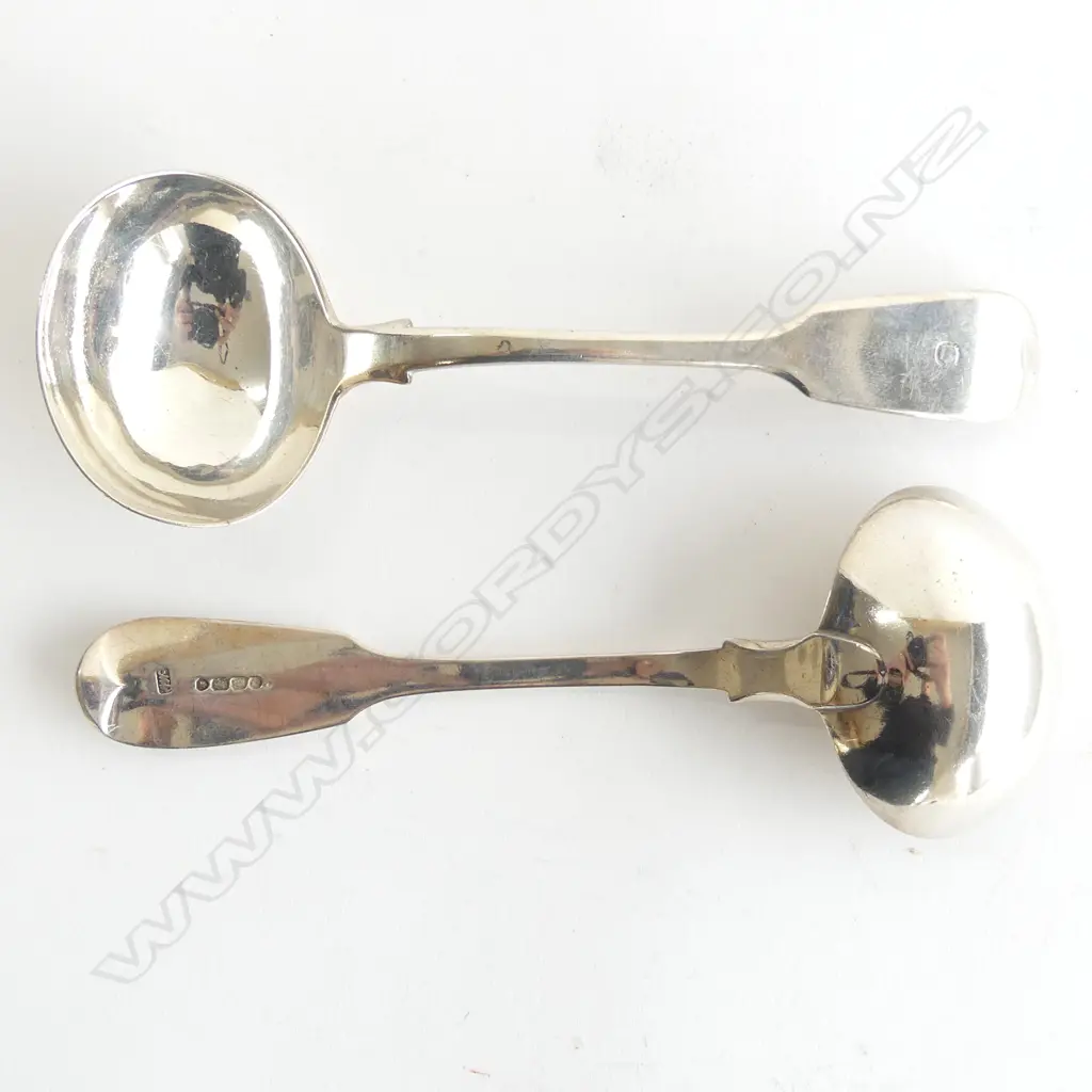 A pair of Victorian silver sauce ladles. London 1845. Monogrammed ‘C’. 145gm Image 1++