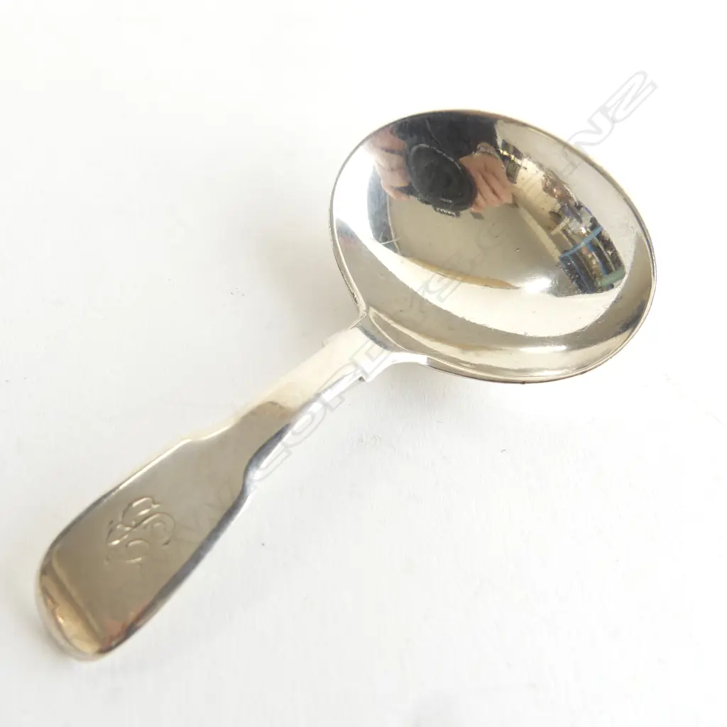 A Victorian period fiddle pattern caddy spoon by Samuel Hayne & Dudley Cater. London 1854. 18gm Image 1++