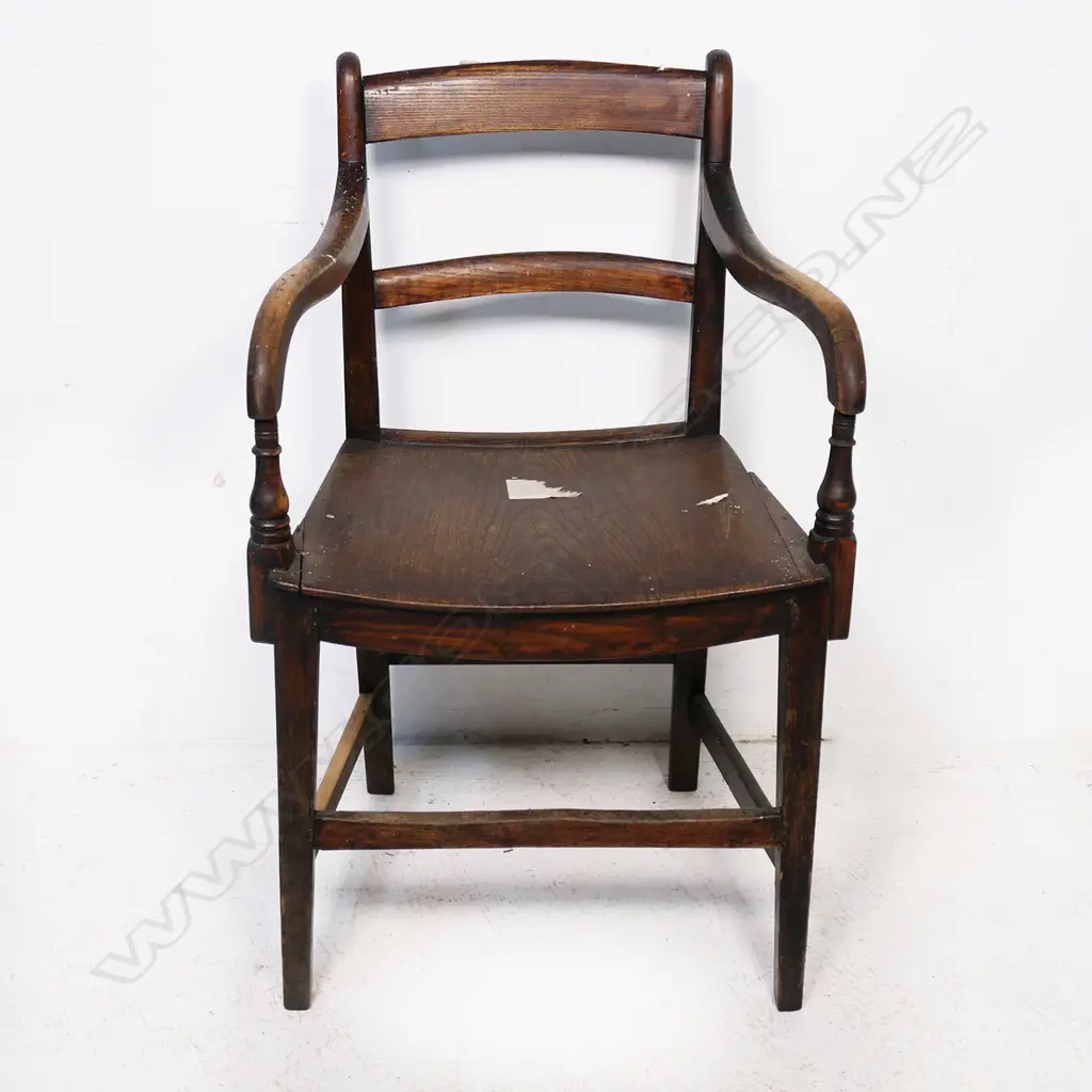 A mid-19thC walnut slat back arm chair, with mahogany paneled seat. Some repairs and old borer. H.820mm Image 1++