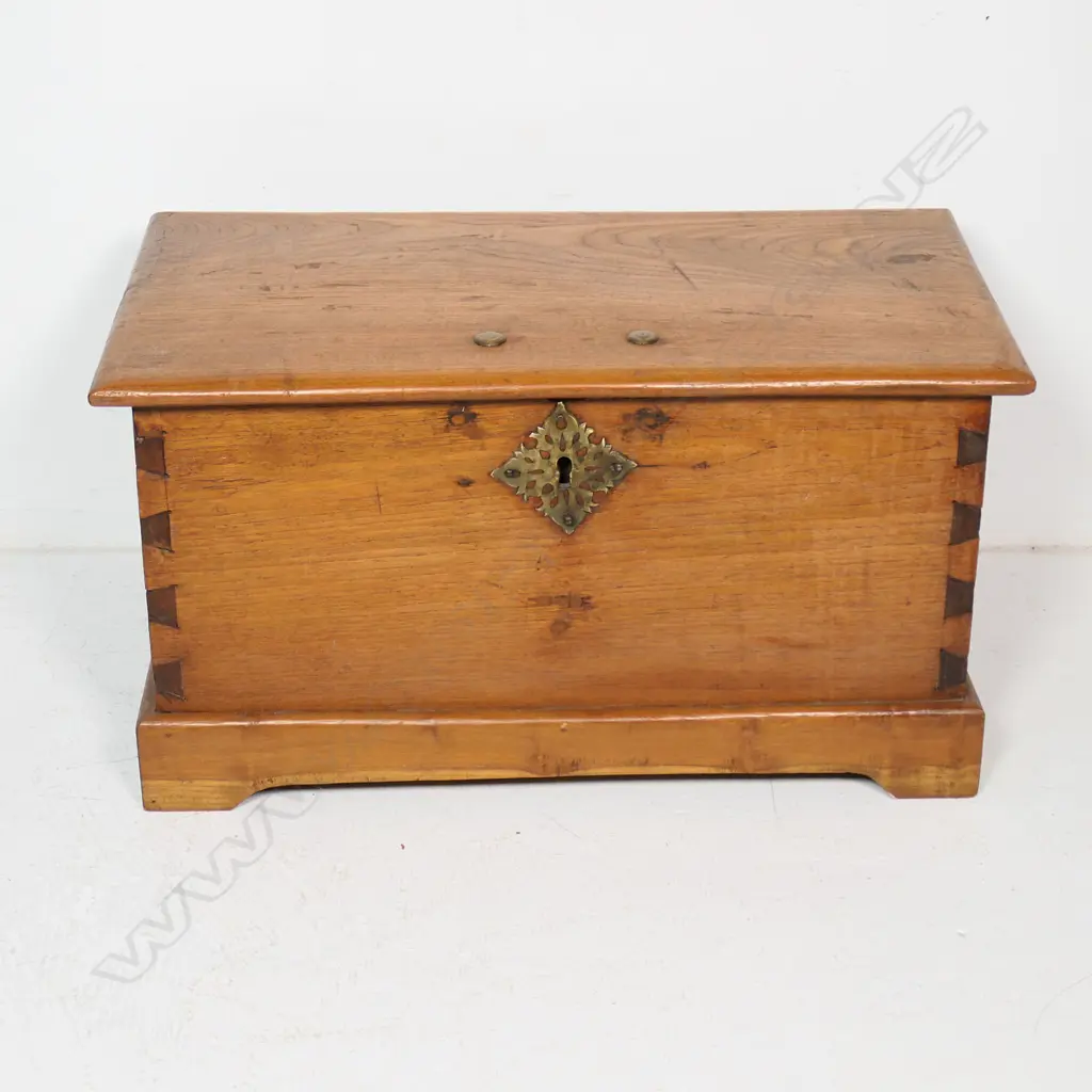 A small teak footlocker, with dovetailed corners and iron carrying handles, a candle box to the interior. 720 x 390 x 390mm. Image 1++