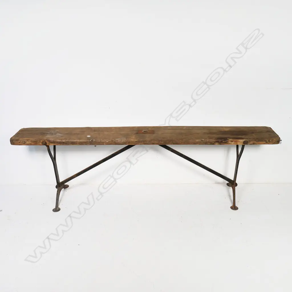 Wrought iron based military campaign bench seat. Broad arrow stamp under wooden seat, L.177mm Image 1++