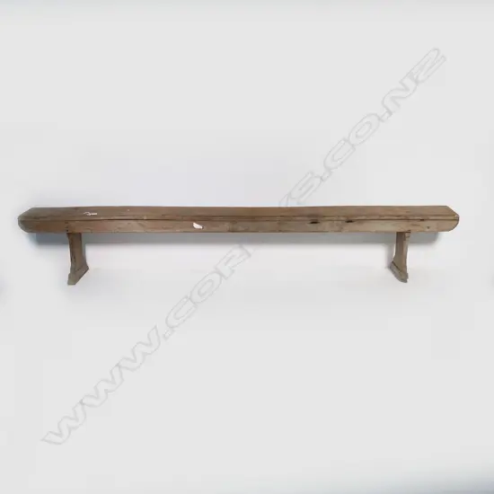 A long wooden form bench