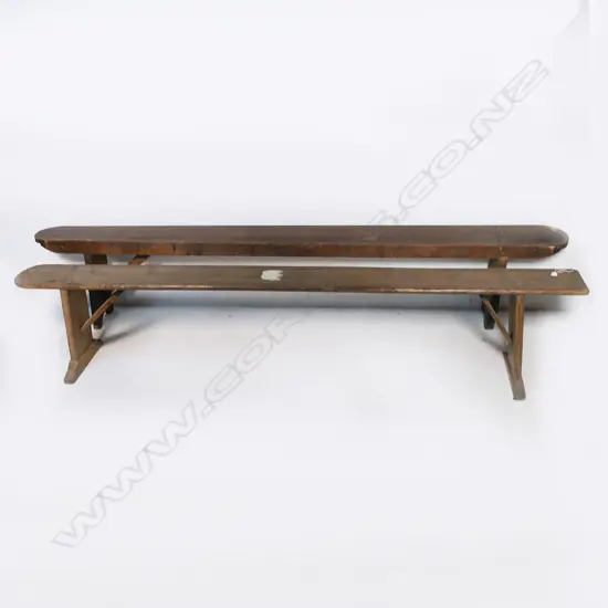 Two long wooden form benches (seats)
