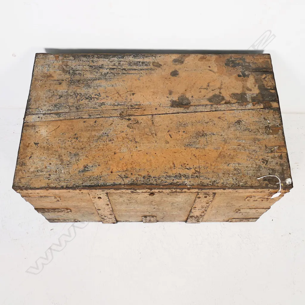 A 19thC iron bound elm trunk with light red-brown remnant paint finish, dovetailed corners with additional iron strapping, iron bale carrying handles, long hinges to interior and mortice lock mechanism. 770 x 470x 400mm Image 1++