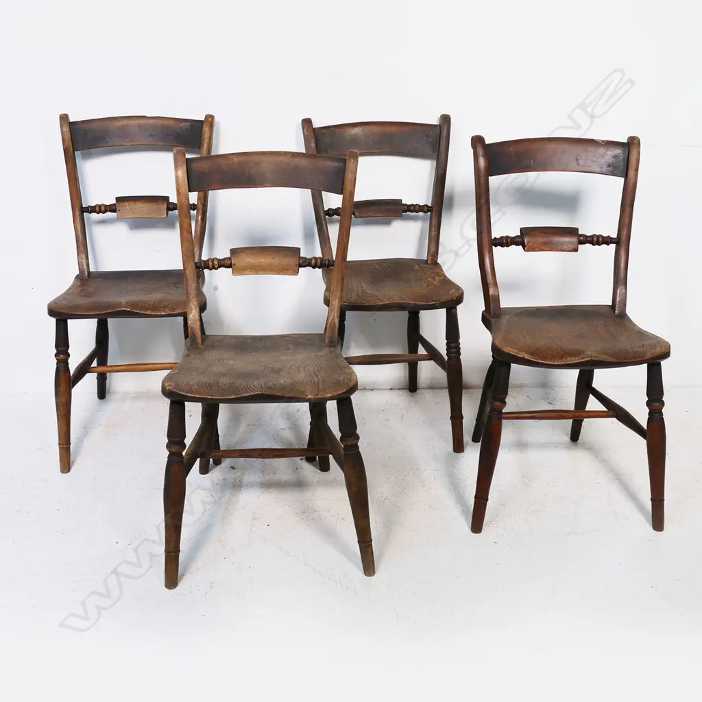 Four 19thC country elm and beech dining chairs, shaped seats, the rail backs with turned supports, turned legs and stretchers. Image 1++