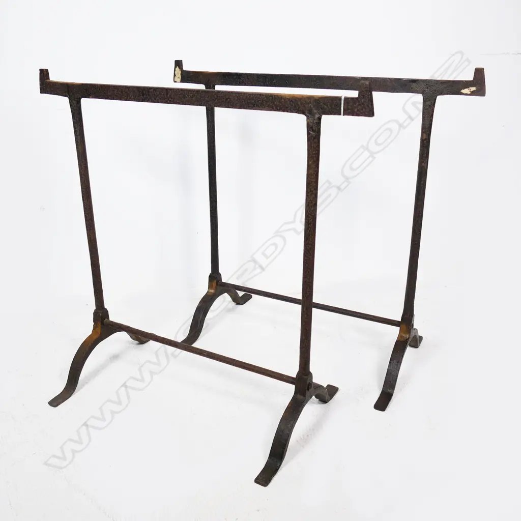 Two stirrup based wrought iron legs for a military campaign table, H.770mm Image 1++