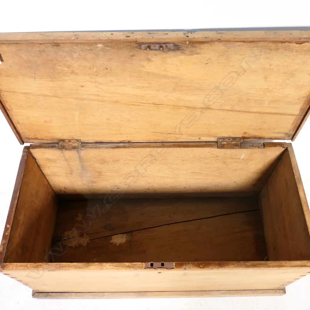 A N.Z. colonial rimu storage box of plain oblong shape with metal side handles and plinth base. 930 x 420 x 455mm Image 1++