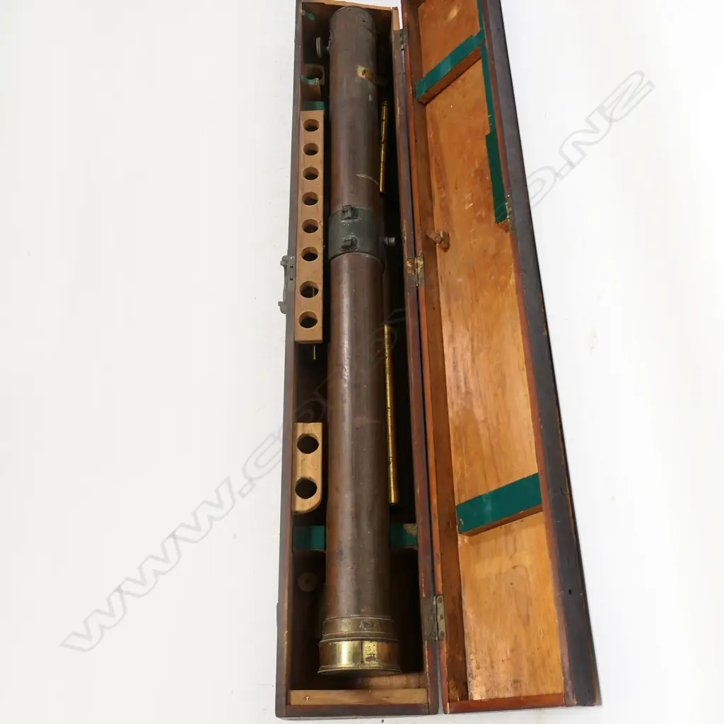 A late 19thC large telescope, in original case, with associated lenses, without tripod stand. Image 1++