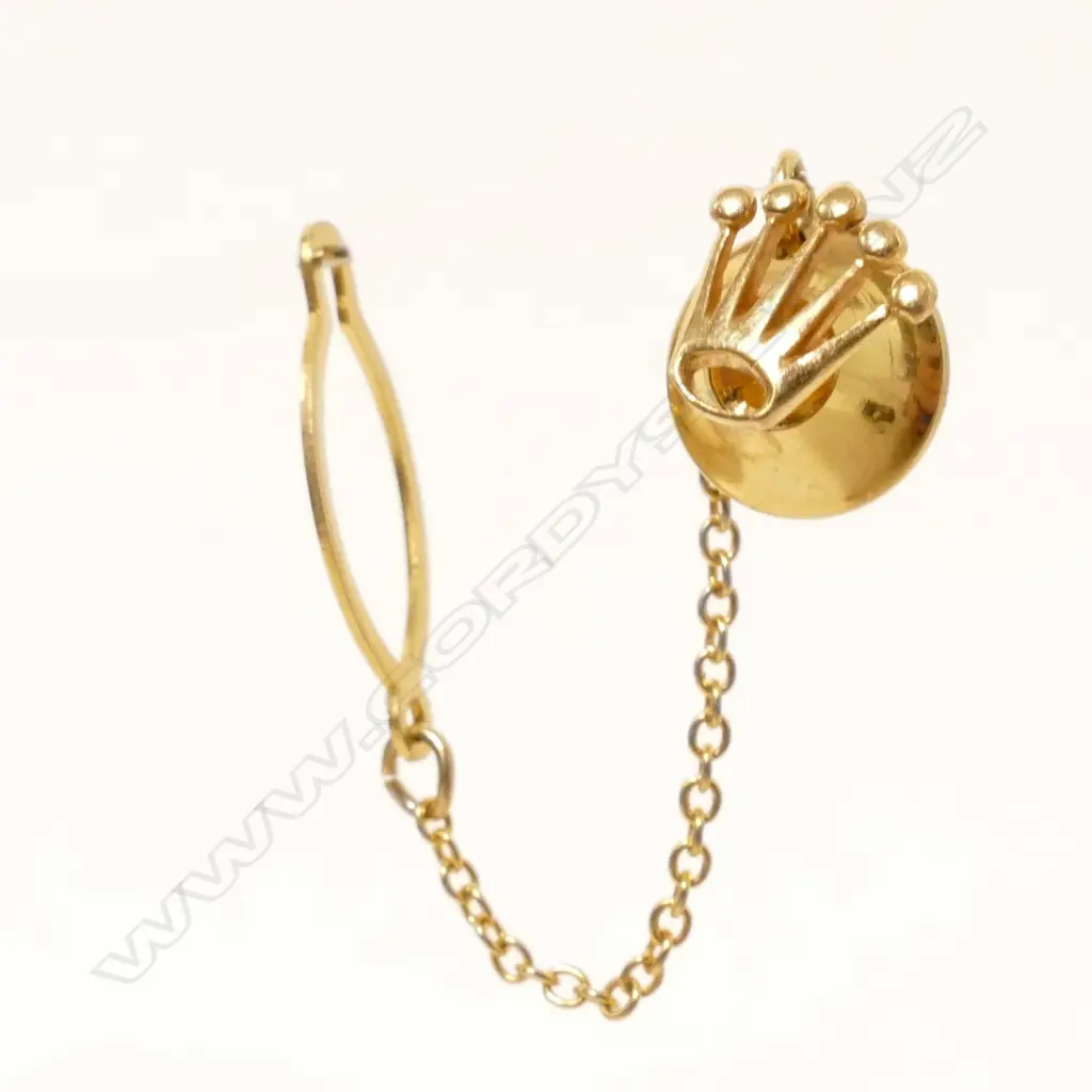 An 18ct. gold Rolex crown motif tie tack Image 1++