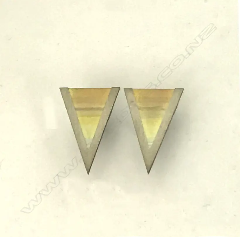 A vintage pair of Nick Charlton titanium earrings Image 1++