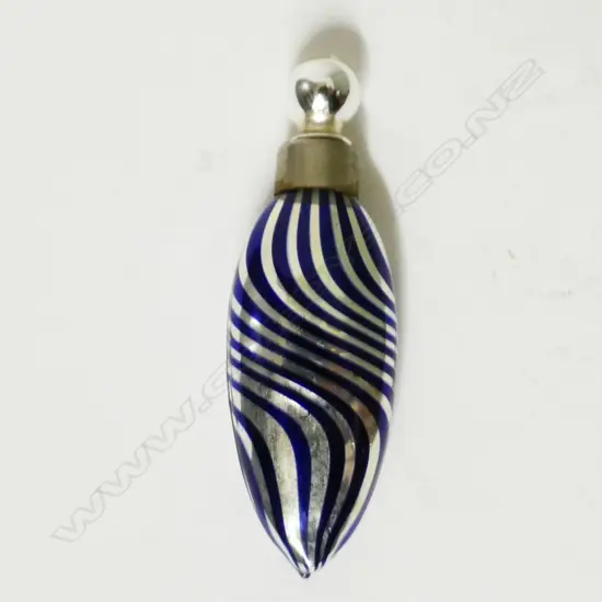 A vintage German mercury glass perfume bottle
