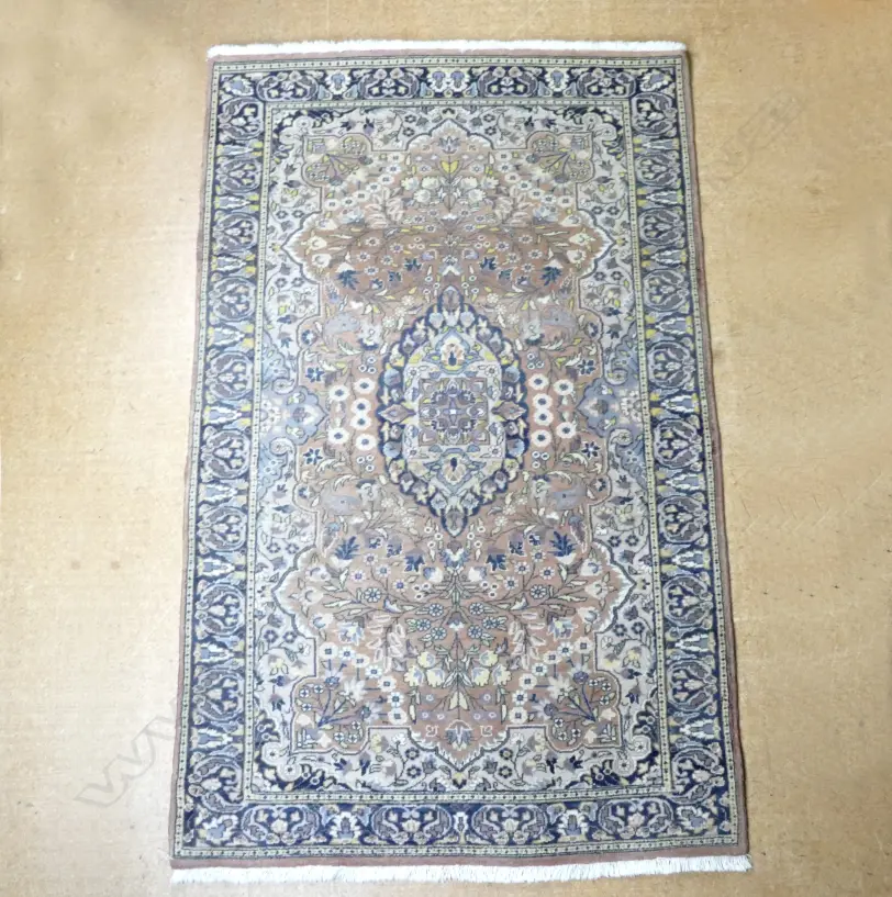 A hand knotted Iranian rug Image 1++