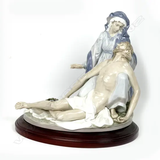 A Lladro figure group