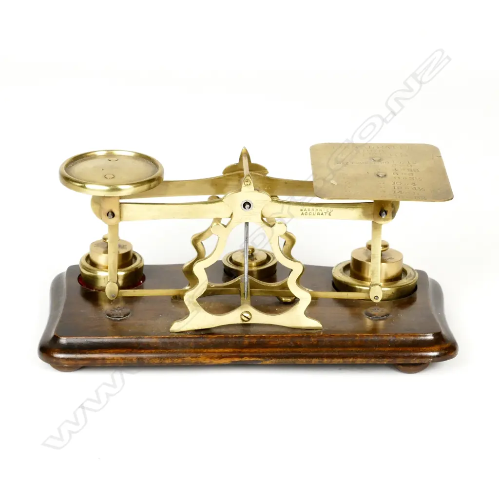 A set of brass postal scales on wood stand. Length 250 Image 1++