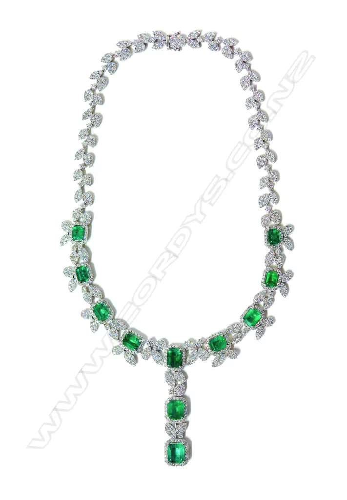An impressive modern 18ct. white gold emerald and diamond necklace Image 1++