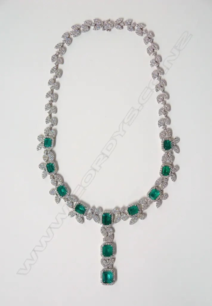 An impressive modern 18ct. white gold emerald and diamond necklace Image 1++