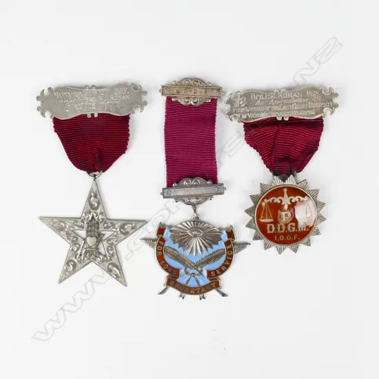 Three silver Masonic badges