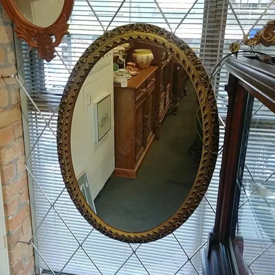 DECORATIVE OVAL MIRROR