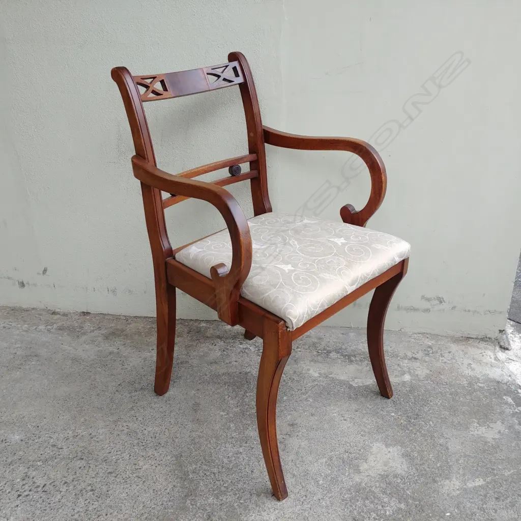 A Regency style mahogany open elbow chair Image 1++
