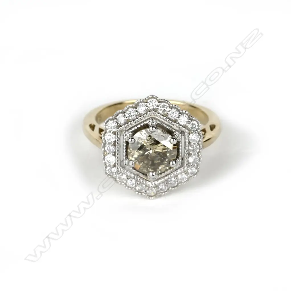 A Cartier style 9ct. gold and diamond cluster ring Image 1++