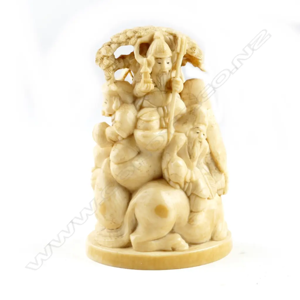 A carved Japanese marine ivory okimono group Image 1++