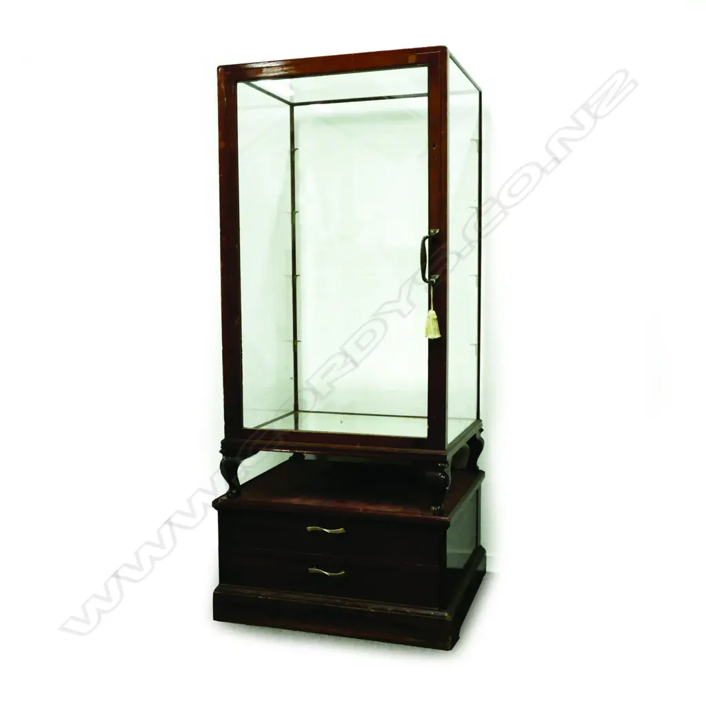 A 1920s mahogany framed and glazed shop display cabinet of compact size Image 1++