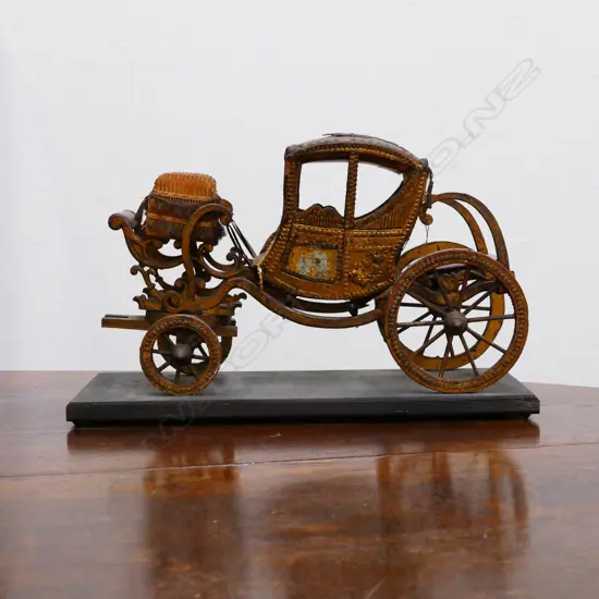A vintage toy Georgian carriage