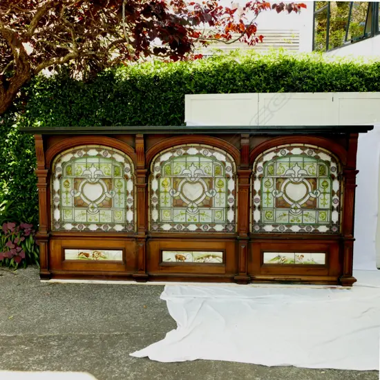 An impressive mahogany and leadlight triple window