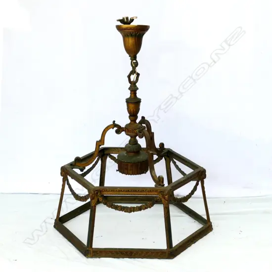 A vintage brass hanging light fitting