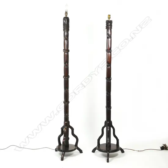Two Chinese hardwood standing lamps