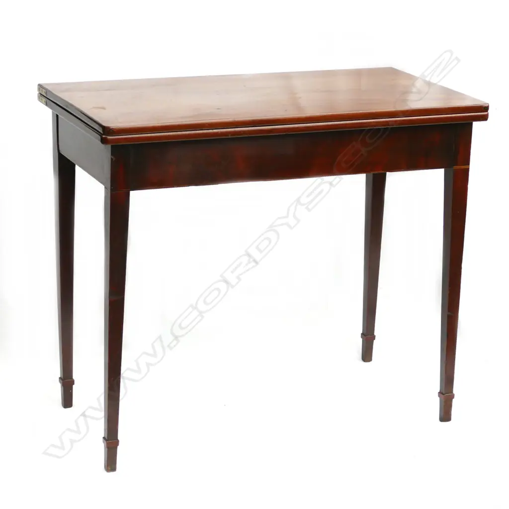 A late Georgian mahogany fold-over top tea table Image 1++