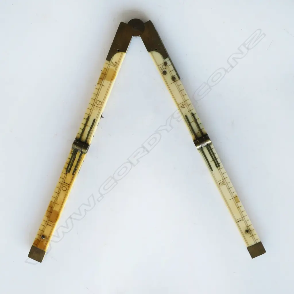 E. Preston 12" Folding Ivory Ruler (with nickel silver repair) Image 1++