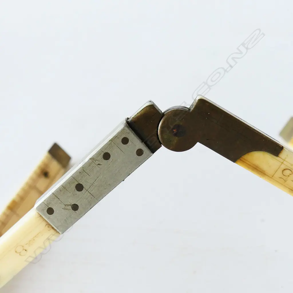 E. Preston 12" Folding Ivory Ruler (with nickel silver repair) Image 1++