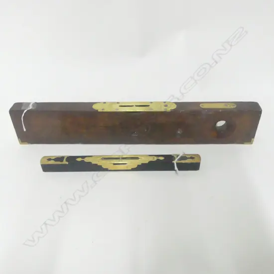 Preston Wooden Level with Brass Inset, and another Scottish ebony and brass level. (2)
