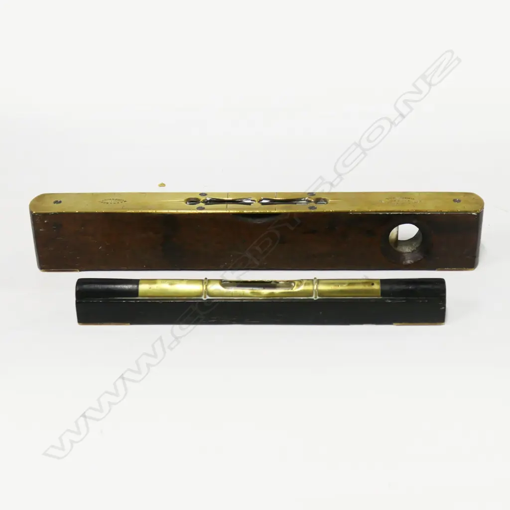 Rabone 12" brass framed mahogany level and Mathieson, Glasgow 9" brass & ebony level (2) Image 1++