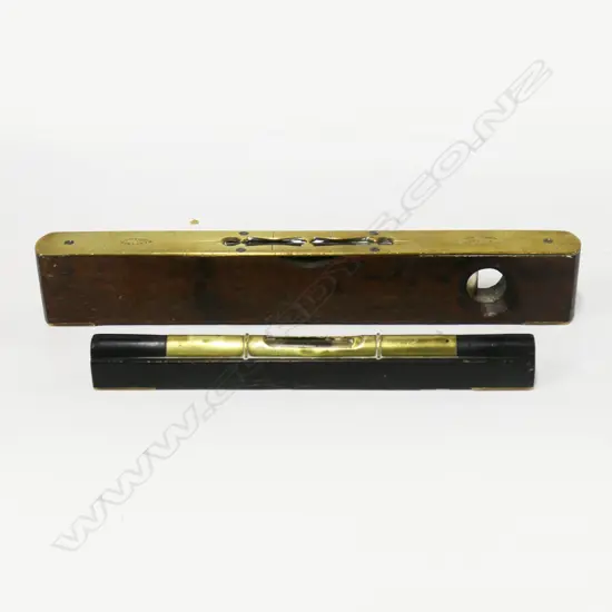 Rabone 12" brass framed mahogany level and Mathieson, Glasgow 9" brass & ebony level (2)