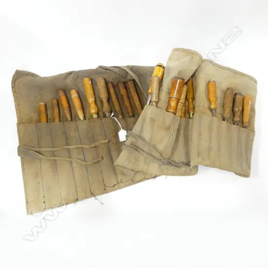 Approximately 28 various chisels and gouges in two canvas pouches