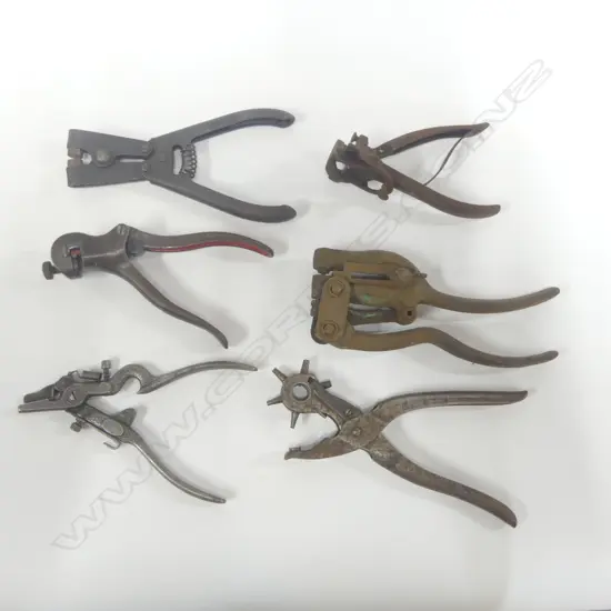 Box of various punches, sets and snips.